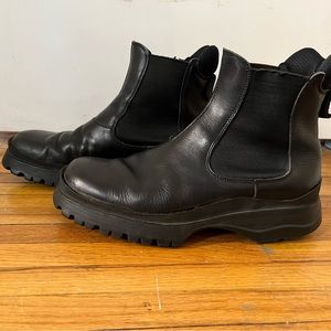 Black leather Prada boots